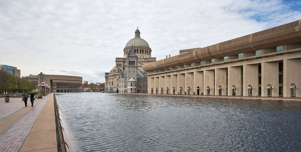 The long reflecting pool at the Christian Science Plaza in Boston with the domed Mother Church beyond.